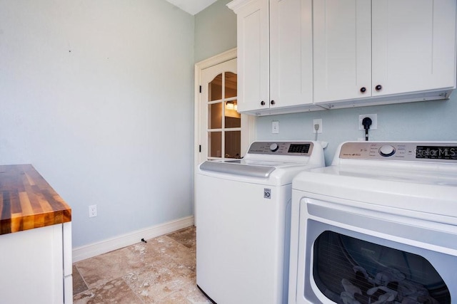 207 W Maxwell St, Lakeland, FL 33803 - laundry room featuring cabinet space and separate washer and dryer