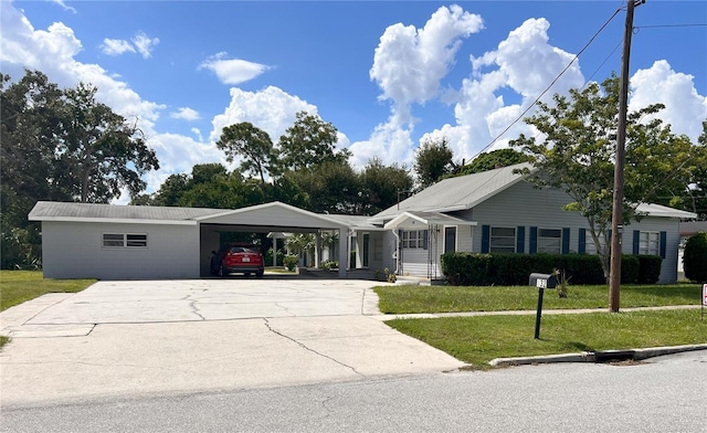 132 Mckean St Unit A, B, Auburndale, FL 33823 - ranch-style home with a front lawn, an attached carport, and concrete driveway