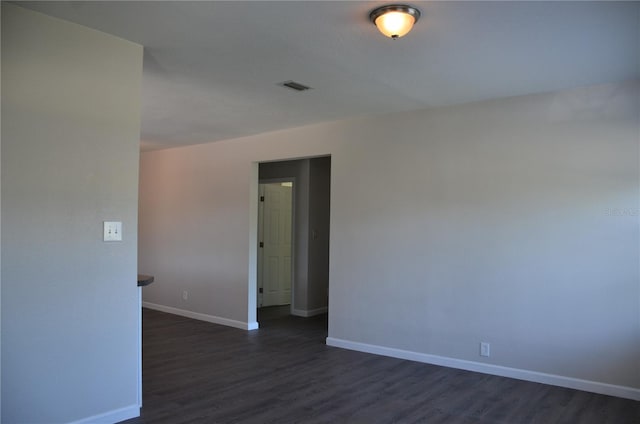 132 Mckean St Unit A, B, Auburndale, FL 33823 - spare room with dark wood-type flooring