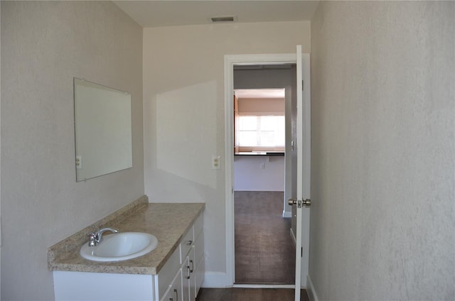 132 Mckean St Unit A, B, Auburndale, FL 33823 - bathroom with vanity and baseboards