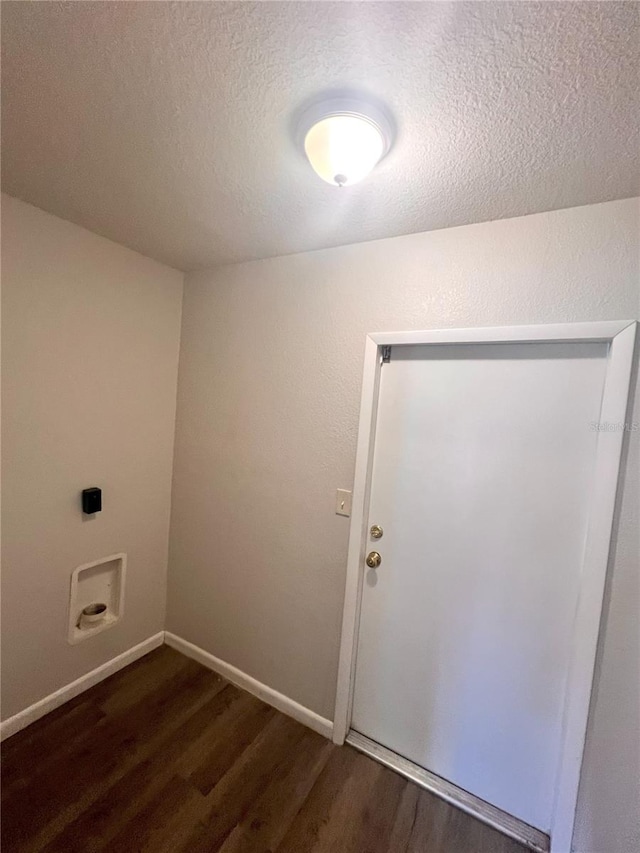 132 Mckean St Unit A, B, Auburndale, FL 33823 - laundry room with dark wood finished floors, hookup for an electric dryer, a textured ceiling, and washer hookup