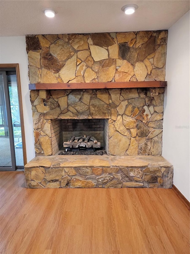 1842 Pinnacle Dr, Lakeland, FL 33813 - detailed view of wood finished floors and a fireplace