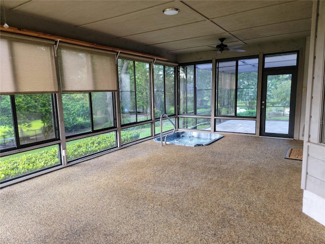 1842 Pinnacle Dr, Lakeland, FL 33813 - unfurnished sunroom featuring a ceiling fan