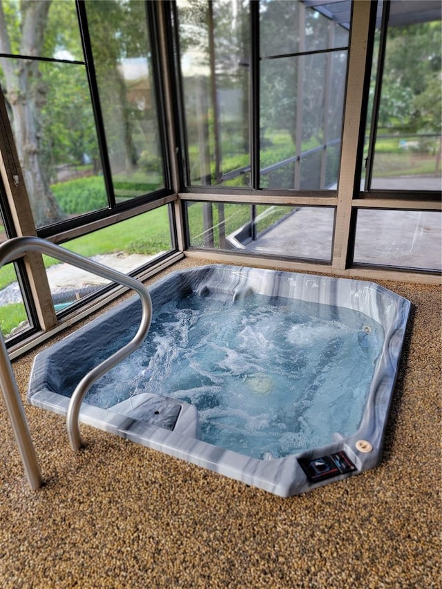 1842 Pinnacle Dr, Lakeland, FL 33813 - sunroom / solarium featuring a hot tub