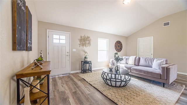 6262 NW 61st St, Ocala, FL 34482 - living area with vaulted ceiling and wood finished floors