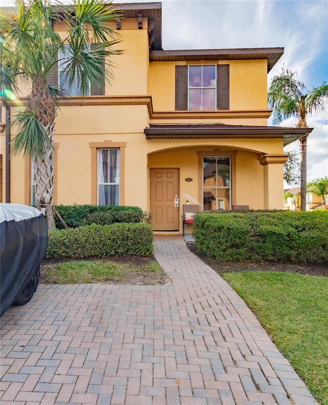 243 Palermo St, Davenport, FL 33897 - view of front of home with stucco siding