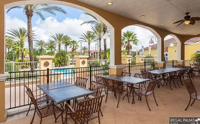 243 Palermo St, Davenport, FL 33897 - view of patio featuring outdoor dining area and a ceiling fan