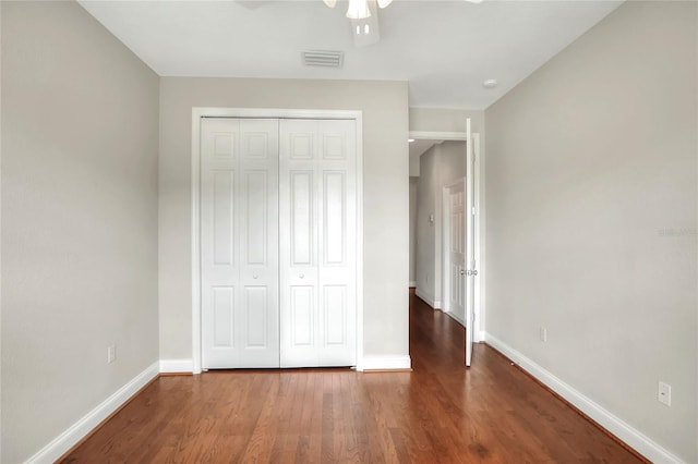 2929 Mission Lakes Dr Unit 10, Lakeland, FL 33803 - unfurnished bedroom featuring wood finished floors, a closet, and ceiling fan