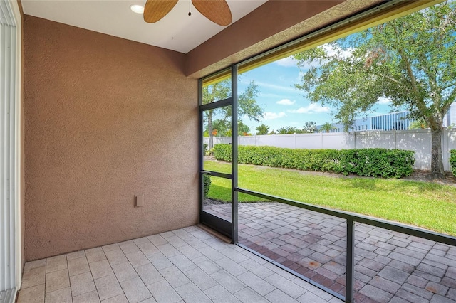 2929 Mission Lakes Dr Unit 10, Lakeland, FL 33803 - unfurnished sunroom with a ceiling fan