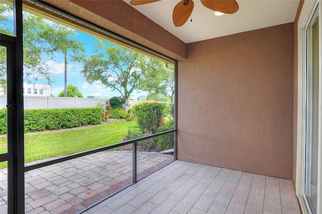 2929 Mission Lakes Dr Unit 10, Lakeland, FL 33803 - unfurnished sunroom with ceiling fan