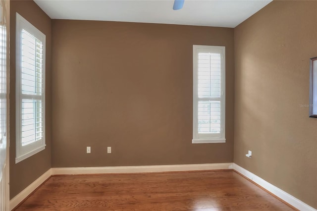 2929 Mission Lakes Dr Unit 10, Lakeland, FL 33803 - empty room featuring wood finished floors and baseboards