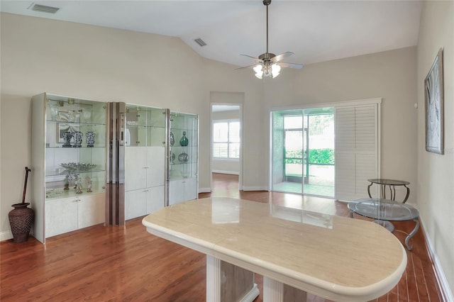 2929 Mission Lakes Dr Unit 10, Lakeland, FL 33803 - dining space with wood finished floors, vaulted ceiling, and ceiling fan