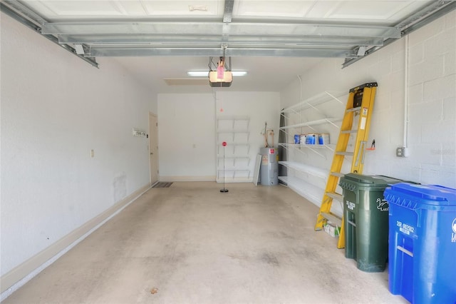 2929 Mission Lakes Dr Unit 10, Lakeland, FL 33803 - garage with electric water heater and a garage door opener