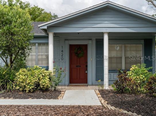 1420 S Lincoln Ave, Lakeland, FL 33803 - doorway to property featuring covered porch