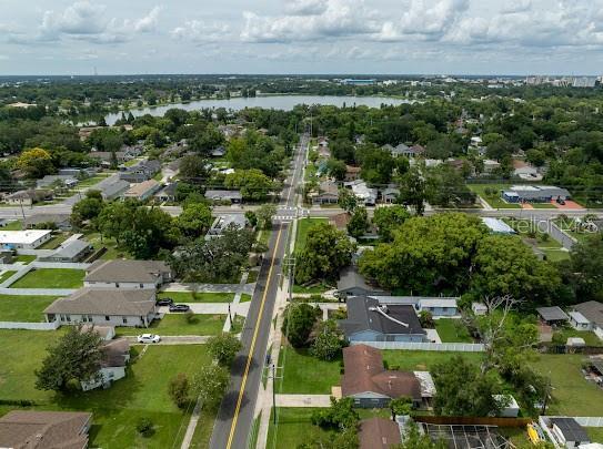 1420 S Lincoln Ave, Lakeland, FL 33803 - aerial view of property and surrounding area with a nearby body of water and nearby suburban area