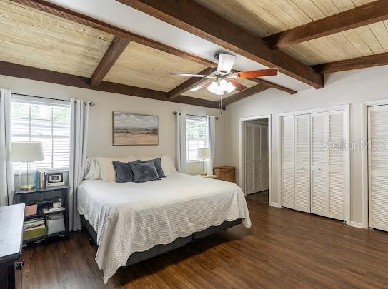 1420 S Lincoln Ave, Lakeland, FL 33803 - bedroom featuring wood finished floors, two closets, and a ceiling fan