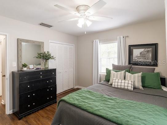 1420 S Lincoln Ave, Lakeland, FL 33803 - bedroom with wood finished floors, a closet, and ceiling fan
