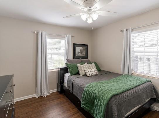 1420 S Lincoln Ave, Lakeland, FL 33803 - bedroom featuring wood finished floors and a ceiling fan