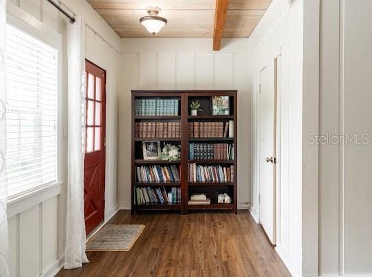 1420 S Lincoln Ave, Lakeland, FL 33803 - entryway with wood finished floors, healthy amount of natural light, a wood ceiling with exposed beams, and a decorative wall
