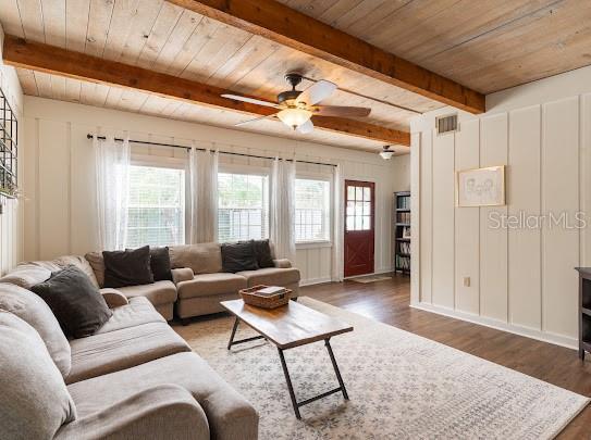 1420 S Lincoln Ave, Lakeland, FL 33803 - living room with a wooden ceiling with exposed beams, wood finished floors, and ceiling fan