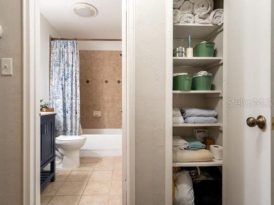 1420 S Lincoln Ave, Lakeland, FL 33803 - full bathroom featuring shower / bath combo, tile patterned floors, and vanity