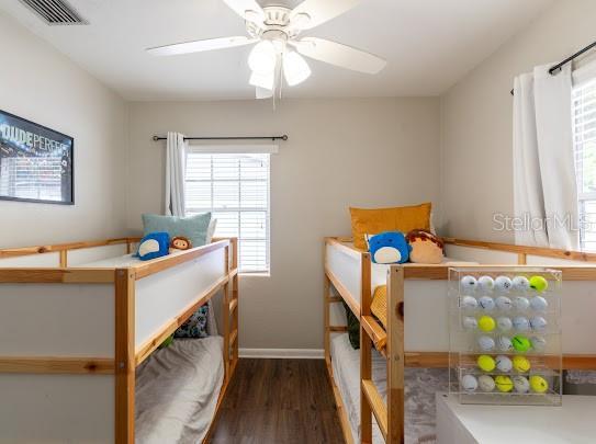 1420 S Lincoln Ave, Lakeland, FL 33803 - bedroom with wood finished floors and baseboards
