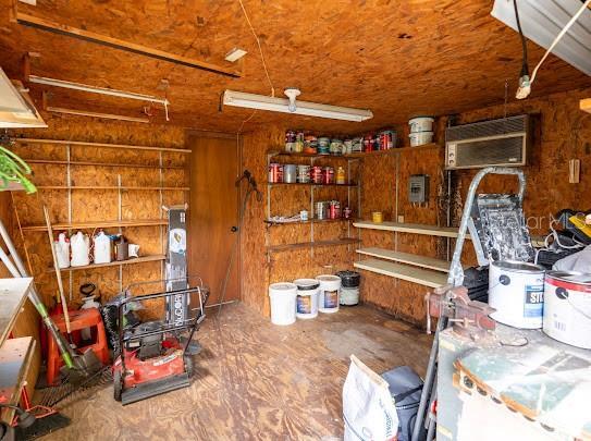 1420 S Lincoln Ave, Lakeland, FL 33803 - storage with a garage and a wall mounted air conditioner
