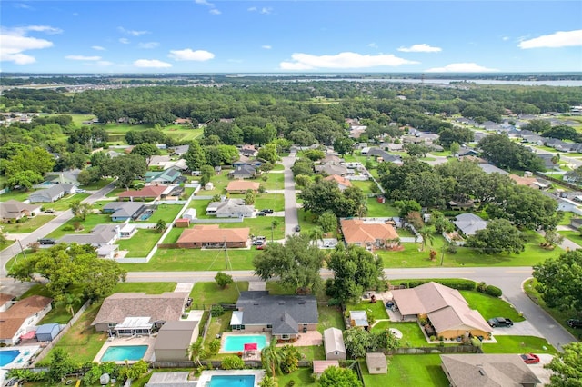 310 Keystone Rd, Auburndale, FL 33823 - aerial perspective of suburban area with a pool