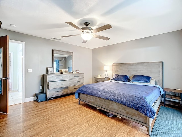 310 Keystone Rd, Auburndale, FL 33823 - bedroom featuring light wood-style flooring and a ceiling fan