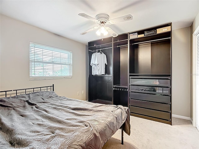 310 Keystone Rd, Auburndale, FL 33823 - carpeted bedroom with a ceiling fan and a closet