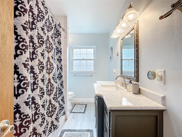 310 Keystone Rd, Auburndale, FL 33823 - bathroom with vanity and wood finished floors