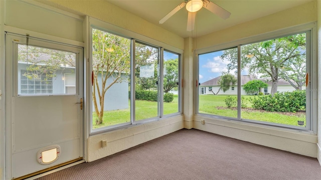 4445 Pebble Pointe Dr, Lakeland, FL 33813 - unfurnished sunroom featuring carpet