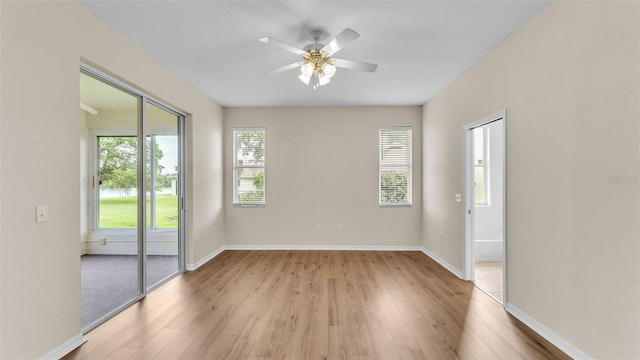 4445 Pebble Pointe Dr, Lakeland, FL 33813 - spare room featuring light wood-style floors and ceiling fan