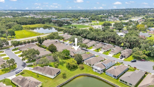 4445 Pebble Pointe Dr, Lakeland, FL 33813 - aerial perspective of suburban area with a large body of water