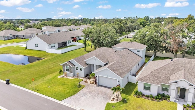 1095 Woodland Oaks Dr, Lakeland, FL 33813 - aerial view of residential area with a large body of water