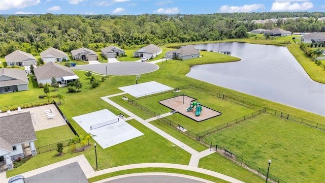 1095 Woodland Oaks Dr, Lakeland, FL 33813 - aerial perspective of suburban area featuring a large body of water and a forest