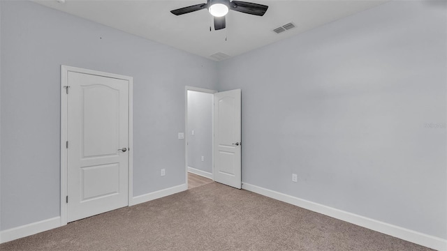 1095 Woodland Oaks Dr, Lakeland, FL 33813 - unfurnished bedroom with carpet floors and ceiling fan
