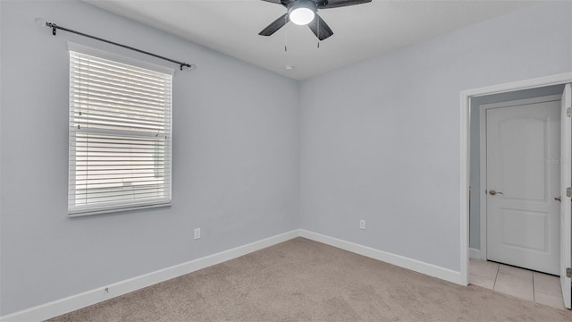 1095 Woodland Oaks Dr, Lakeland, FL 33813 - empty room featuring ceiling fan, light carpet, and healthy amount of natural light