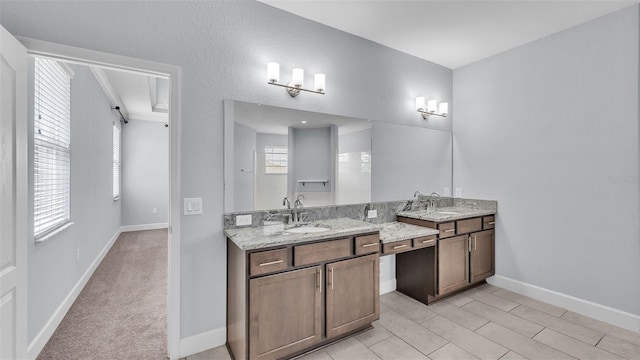 1095 Woodland Oaks Dr, Lakeland, FL 33813 - full bath with double vanity and baseboards