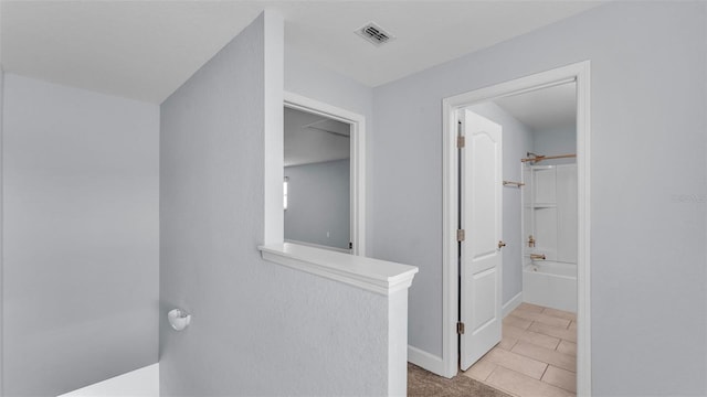 1095 Woodland Oaks Dr, Lakeland, FL 33813 - hallway featuring baseboards
