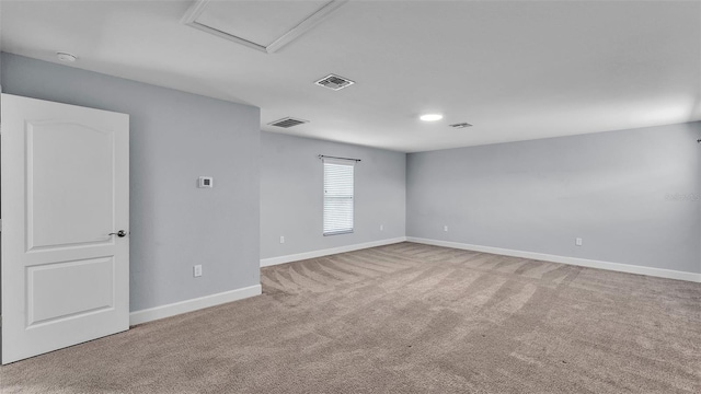 1095 Woodland Oaks Dr, Lakeland, FL 33813 - empty room featuring carpet floors and a smoke detector