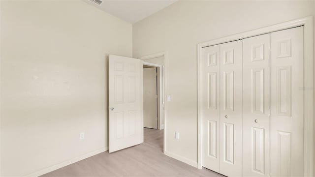 1100 Lowry Ave Unit 69, Lakeland, FL 33801 - unfurnished bedroom featuring a closet and baseboards