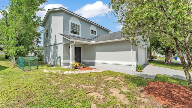 1100 Lowry Ave Unit 69, Lakeland, FL 33801 - traditional home featuring roof with shingles and stucco siding