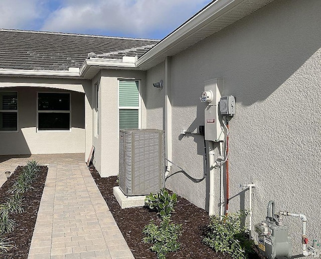 26005 Bimini Sands Ct, Englewood, FL 34223 - view of exterior entry featuring stucco siding