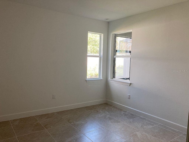 26005 Bimini Sands Ct, Englewood, FL 34223 - unfurnished room with baseboards