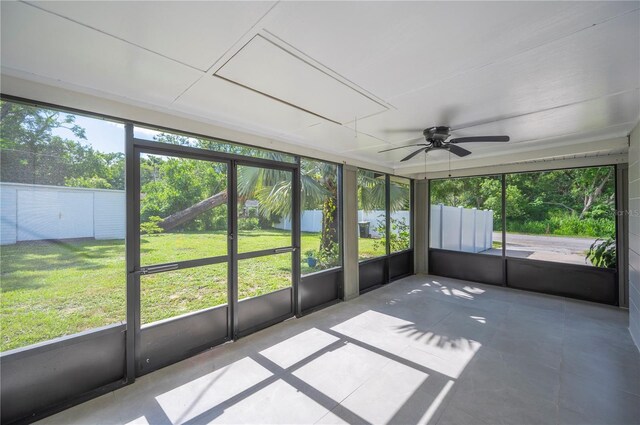1231 Melville Ave, Lakeland, FL 33805 - unfurnished sunroom with ceiling fan and plenty of natural light