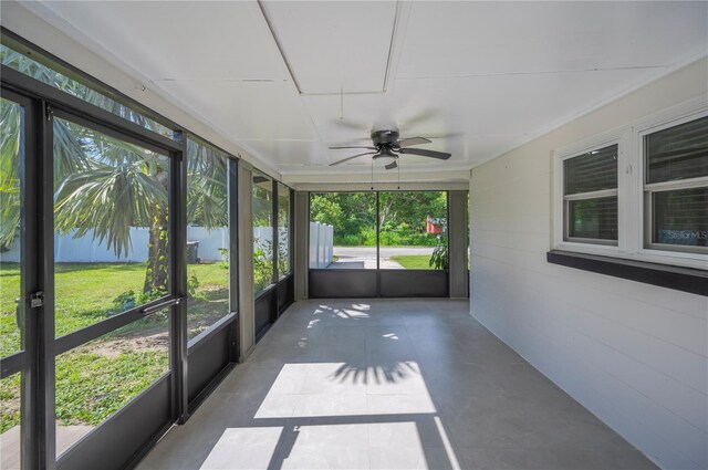 1231 Melville Ave, Lakeland, FL 33805 - unfurnished sunroom with a ceiling fan