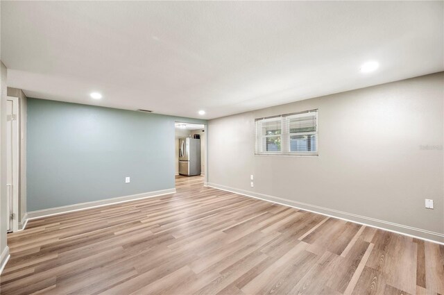 1231 Melville Ave, Lakeland, FL 33805 - unfurnished room featuring light wood-style flooring and recessed lighting