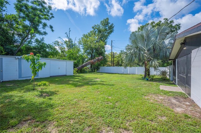 1231 Melville Ave, Lakeland, FL 33805 - view of yard featuring a shed