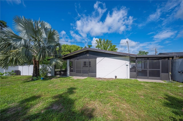 1231 Melville Ave, Lakeland, FL 33805 - back of property featuring a sunroom
